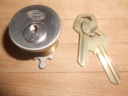 Corbin cylinder lock with 2 blank keys. Brass with stainless-steel faceplate.