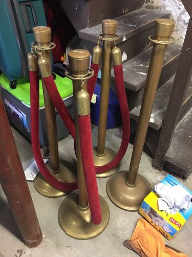 Brass stanchions and red velvet ropes (4 stanchion and 3 ropes) for sale