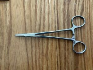 Hemostat; was forced to buy in dental school; brand new, never been used