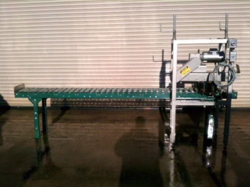 Case conveyor with powered top case compression unit and roll on date coder for sale