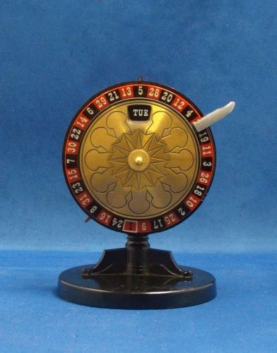 Vintage 1950&#039;s remembrance roulette wheel of fortune desk calendar, functioning for sale