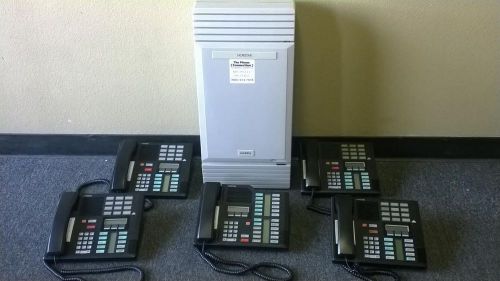Nortel mics phone system package with (4) m7310 and (1) m7324 receptionist phone for sale
