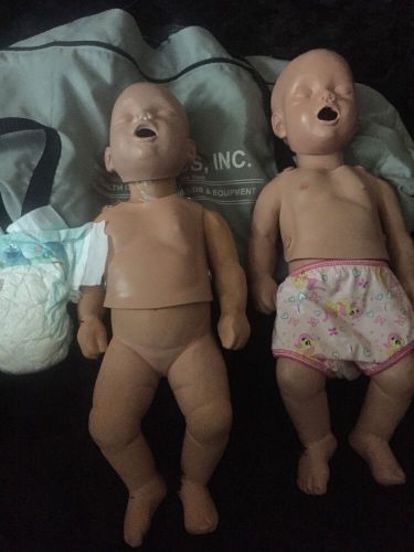 (2) Two Simuliads Infant CPR Training Manikin With Carrying Case