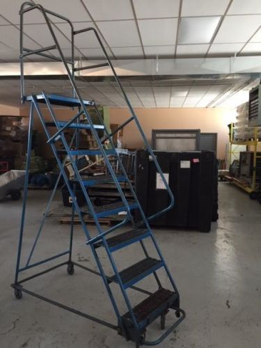 Warehouse ladders on wheels / eight steps 82&#034; high / 26&#034; wide for sale