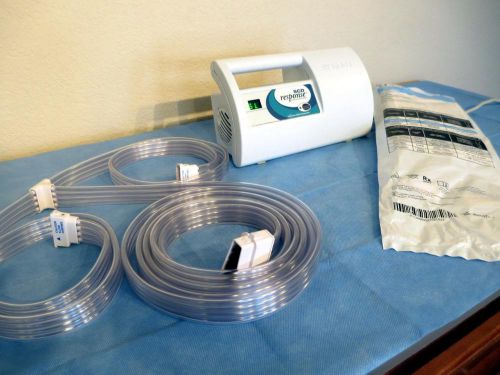 Kendall 7325 scd response compression system w/ tubing and new medium sleeves for sale