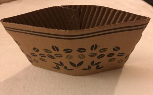 100 Brown Coffee Cup Sleeves With Coffee Beans Printed On Them