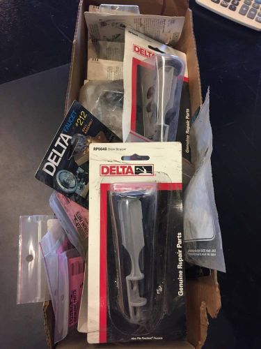 Box of delta plumbing parts for sale