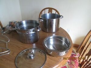 4 PIECE STAIN. STEEL 9.3  STOCK POT, 1 STEAMER,1 STRAINER PAN W/LID REVERE WARE