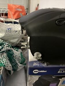 Miller Digital Elite Welding Helmet - 257213. Dog Chewed A Bit Of The Helmet.