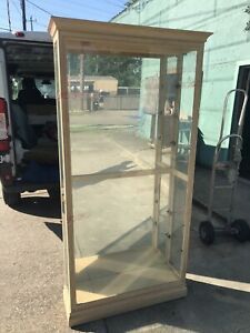 Howard Miller display cabinet 37 inches wide 80 inches tall and 12 inches deep