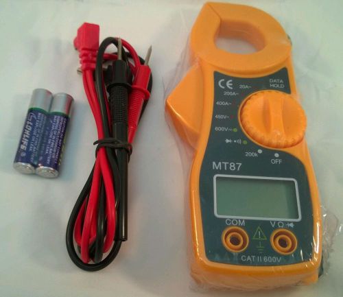 Digital clamp style multimeter with batteries and leads included. retail box set for sale