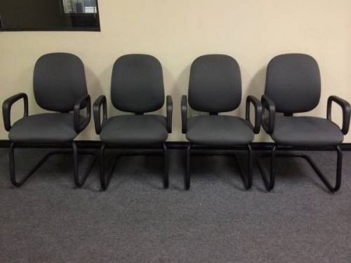 Four office chairs