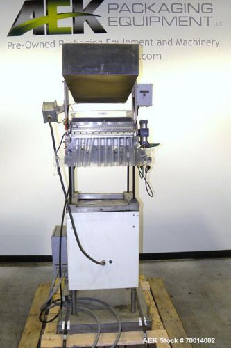 Used- Merrill Pennwalt Model 15-10 (10) Head Desiccant Canister Dropper. Machine