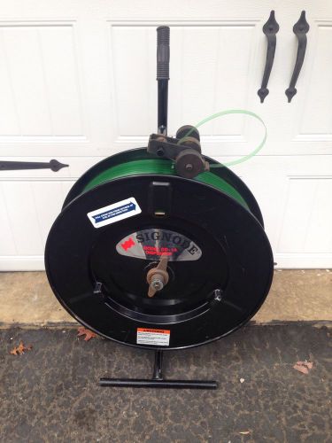 Signode dd-1a strapping dispenser, banding machine with full reel for sale