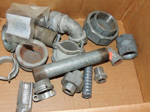 Assorted lot of galvanized plumbing and electrical pipe fittings and hardware. for sale