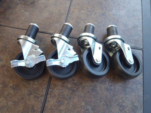 Stainless steel table caster set     (new)    2 locking/2 non locking   4 inch for sale