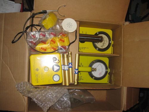 2 CD Geiger counters, calibrated, extras-  headset, straps, 4 dosimeters+charger