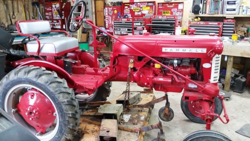 Farmall farmall cub Tractor with woods mower and accessories
