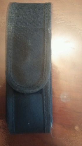Unknown black nylon flashlight holder