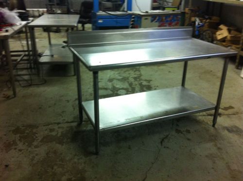 stainless steel table 60&#034;x30&#034; with 6&#034; back splash