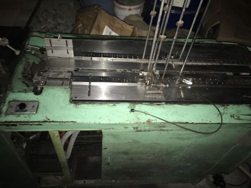 BIVANS Tuck-O-Mat Automatic Bottom Closing/Cartoner Machine