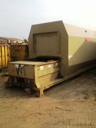 Roll-off  ptr 30 yard self contained compactor with power pack for sale