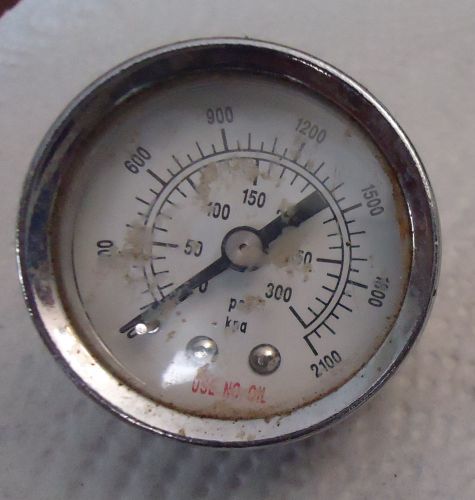 Pressure gauge to 300 psi and 2100 kpa, 1 5/8&#034; across face, 3/8&#034; nipple for sale