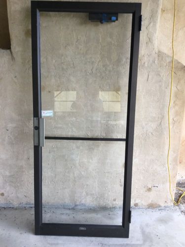 Kawneer commercial glass door with hardware crash bar closer aluminum metal