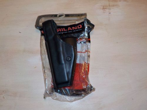 New in Package Safariland 200-83 Glock Holster Gloss Black Left Handed