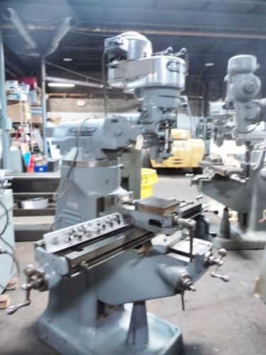 Bridgeport vertical mill with r 8 collets and 6&#034; machine vice and power feed for sale