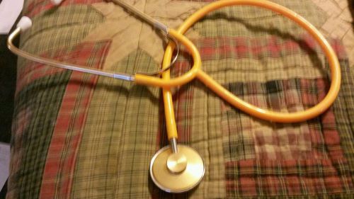 Vintage orange stethoscope. for sale