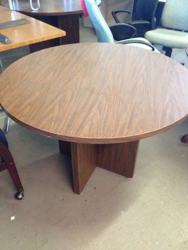 Round table in walnut color laminate w/ x-base 42&#034;diam for sale
