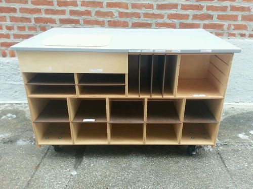 Modern sorting/Organizing/cubby table on wheels