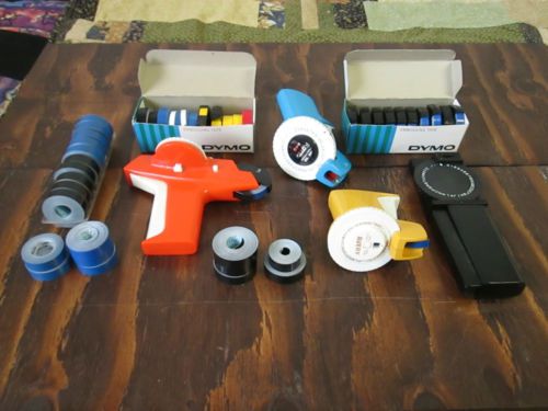 LOT OF LABLE MAKERS AND 40 ROLLS OF EMBOSSING TAPE.ALL ARE IN WORKING ORDER.
