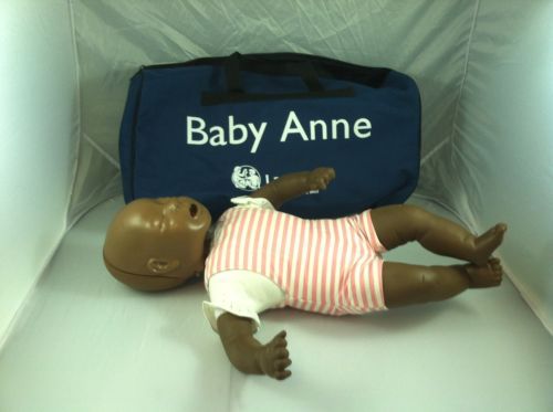 New CPR baby Laerdal Little Anne Manikin with Soft Pack Training Mat dark Skin