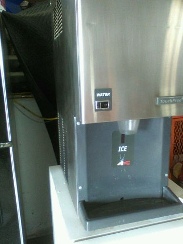 Two year old Scotsman touch free  crush ice machine. For sale $800 dollars