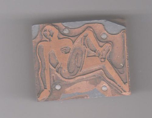 Man Stretching Copper Printer Block