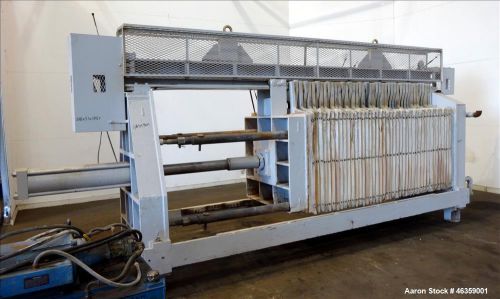 Used- Filter Press. Carbon steel frame with 42 polypropylene plates. Plates are