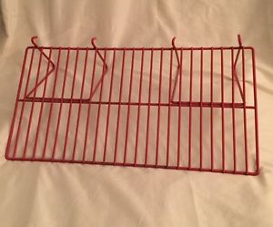 Four used red wire slatwall or gridwall shelves for sale