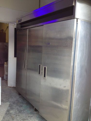 Delfield 3 Solid Door Reach-In Refrigerator Stainless Steel 6076-S on Casters