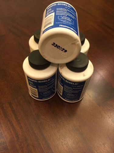 Lot of 5 bottles cp8-tb 1/2 pound thomas &amp; betts kopr-shield conductive compound for sale