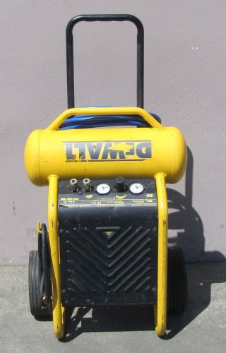 Dewalt 4.5 gallon portable wheeled air compressor d55146 with hose for sale