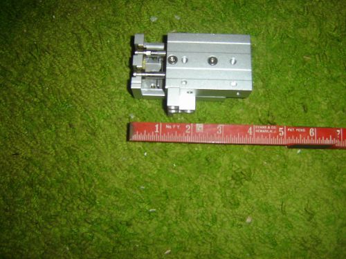 ONE allmost NEW SMC mod MXS12-10 PNEUMATIC  SLIDE, mounted but NEVER USED
