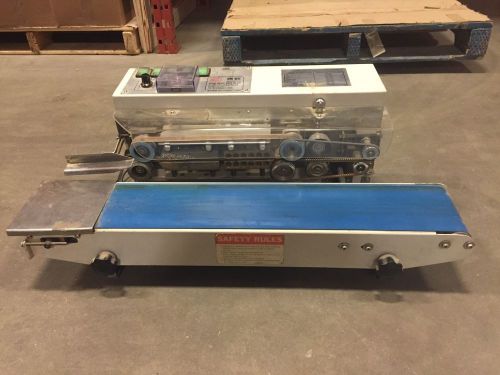 Horizontal in-line bag sealer with variable speed conveyor - printer for sale