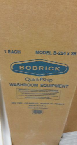 Bobrick b224x36 utility shelf with mop and broom holders and rag hooks for sale