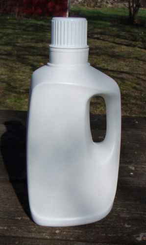 64 ounce white drain back bottles with caps, $1.00 each. Min. Order 696