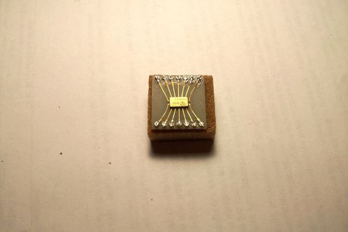 TI    Nice little very old style 14 pin IC    Great collectable