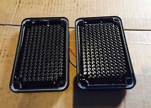 Two Whelen 600 Series Led Lights