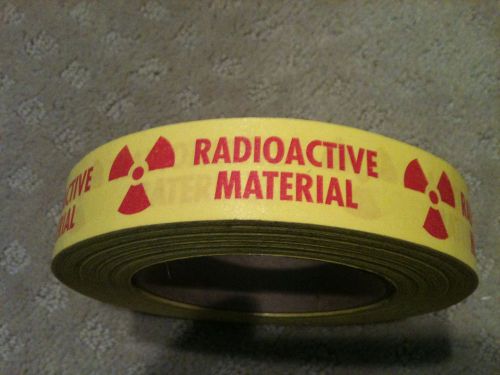 Yellow tape &#039;radioactive material&#039; partial roll used with rad symbol for sale