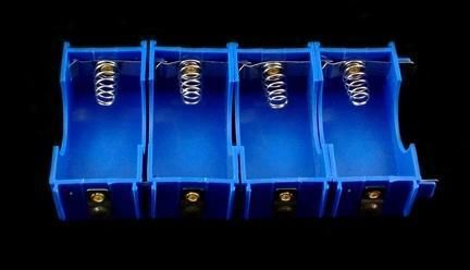 4 blue interlocking plastic d-cell battery holders for sale